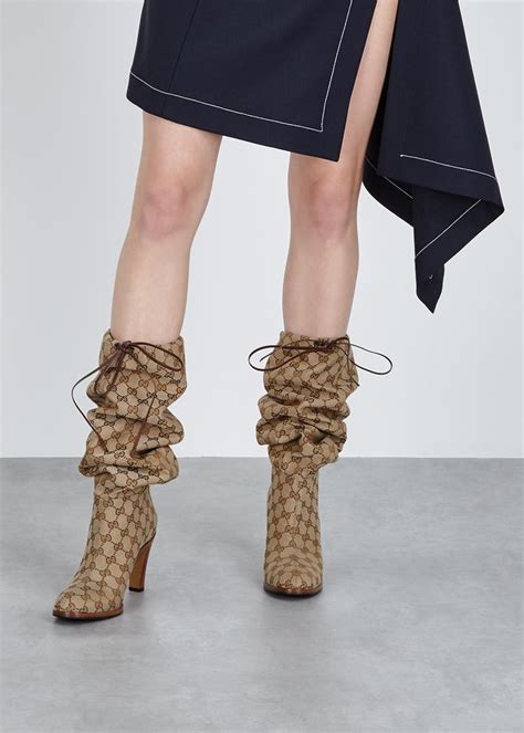 gucci monogram thigh high boots price|gucci monogram boots original price.